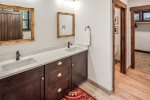 Master bathroom en suite with double vanity